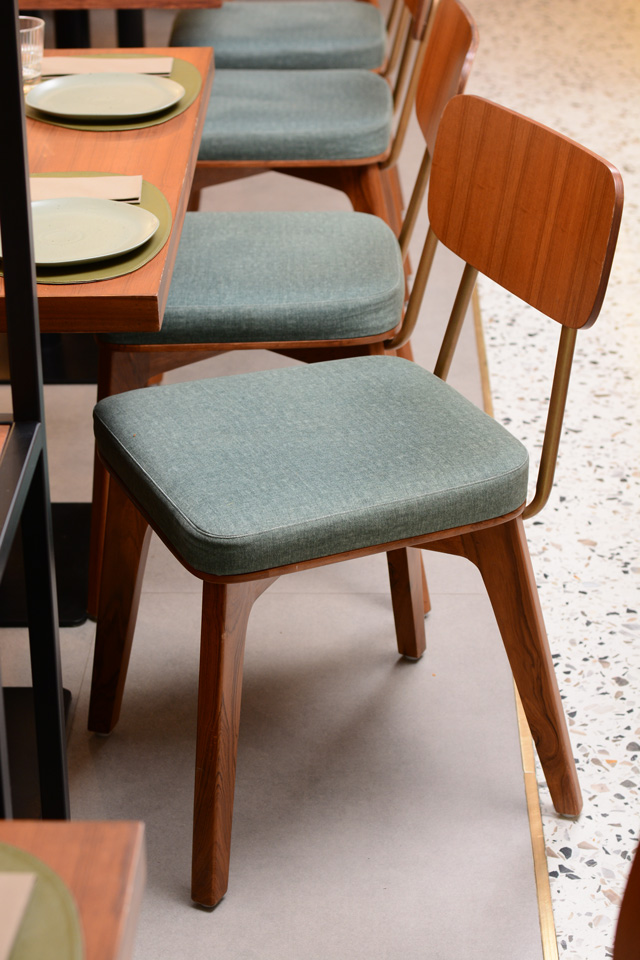 Lap and Dado Furniture for Plats Restaurant - custom made cafe chairs in teakwood and metal based on the mid century modern U-chair