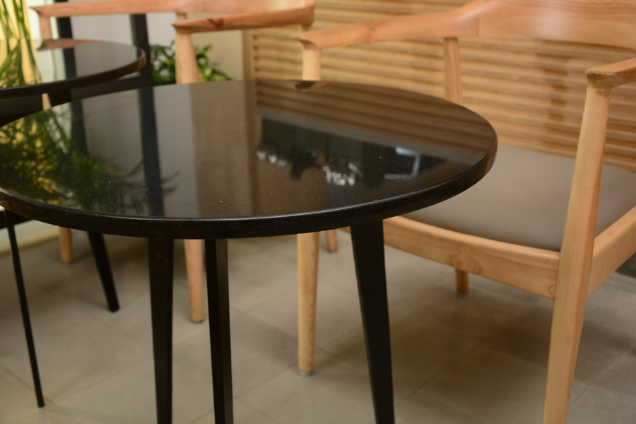 Lap and Dado Furniture Alma Cafe and Bakery - Stone table top with metal legs
